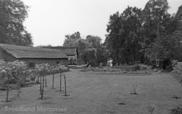 Riverside garden, Norfolk Broads 1960s