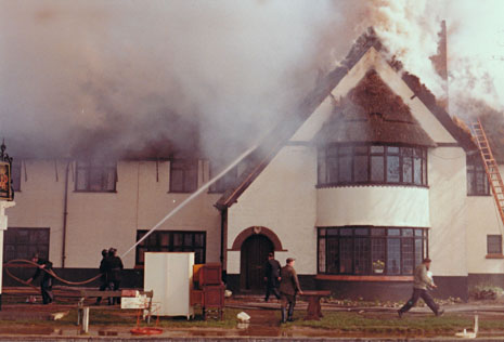 The fire at Horning Ferry Inn captured by Pete Clark in 1965